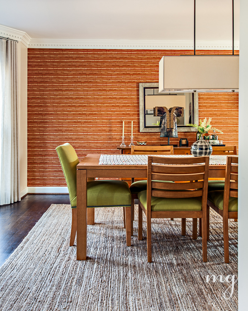 View of Dining Room with Orange Faux Grasscloth and Natural Grass Rug