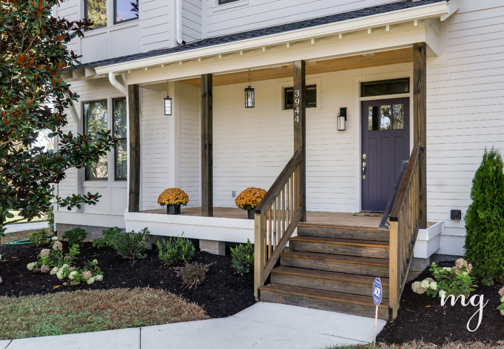 Best Residential Exterior - Dark Wood Stained Porch with Purple door