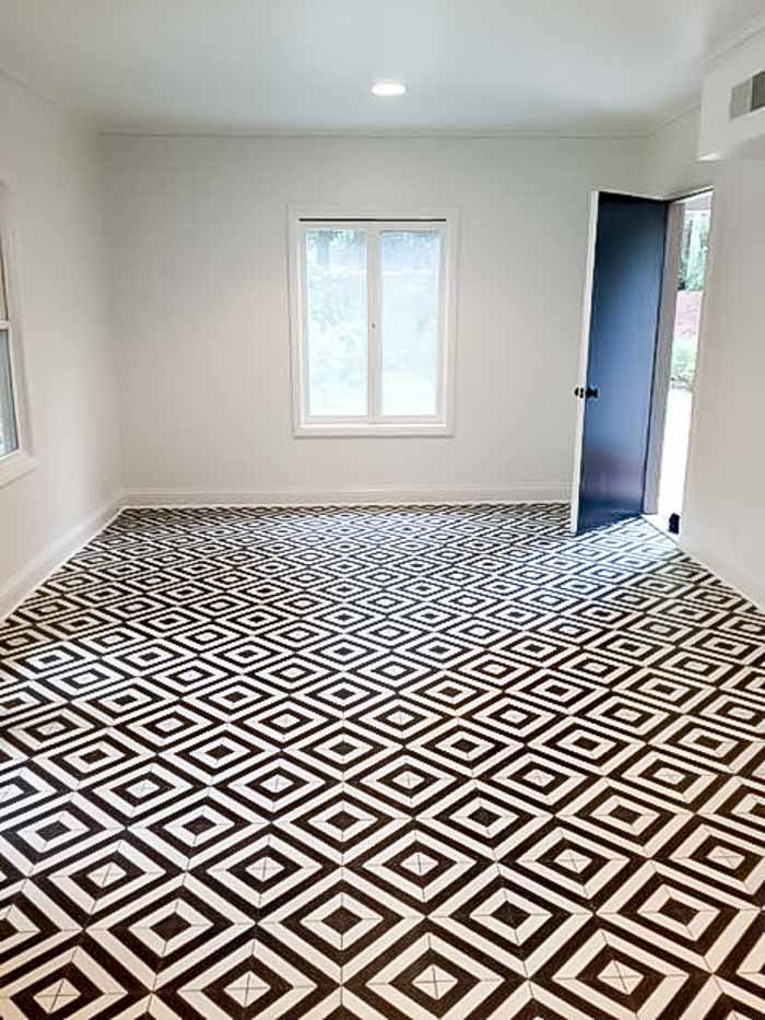 striking black and white tile floor for pool house
